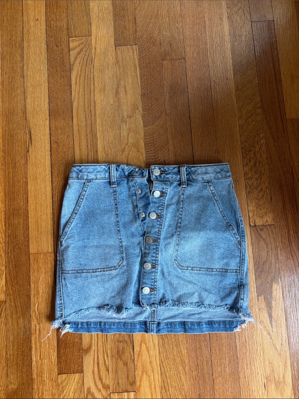Cat & Jack Light Blue Button-Front Denim Mini Skirt** cut in the front